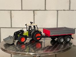 Spielzeug Traktor Claas mit Schaufel und Anhänger