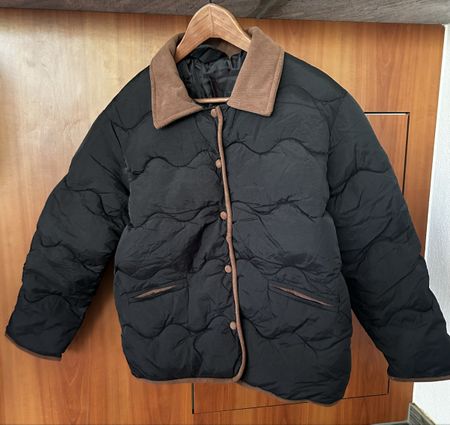 Steppjacke Schwarz mit braunen details