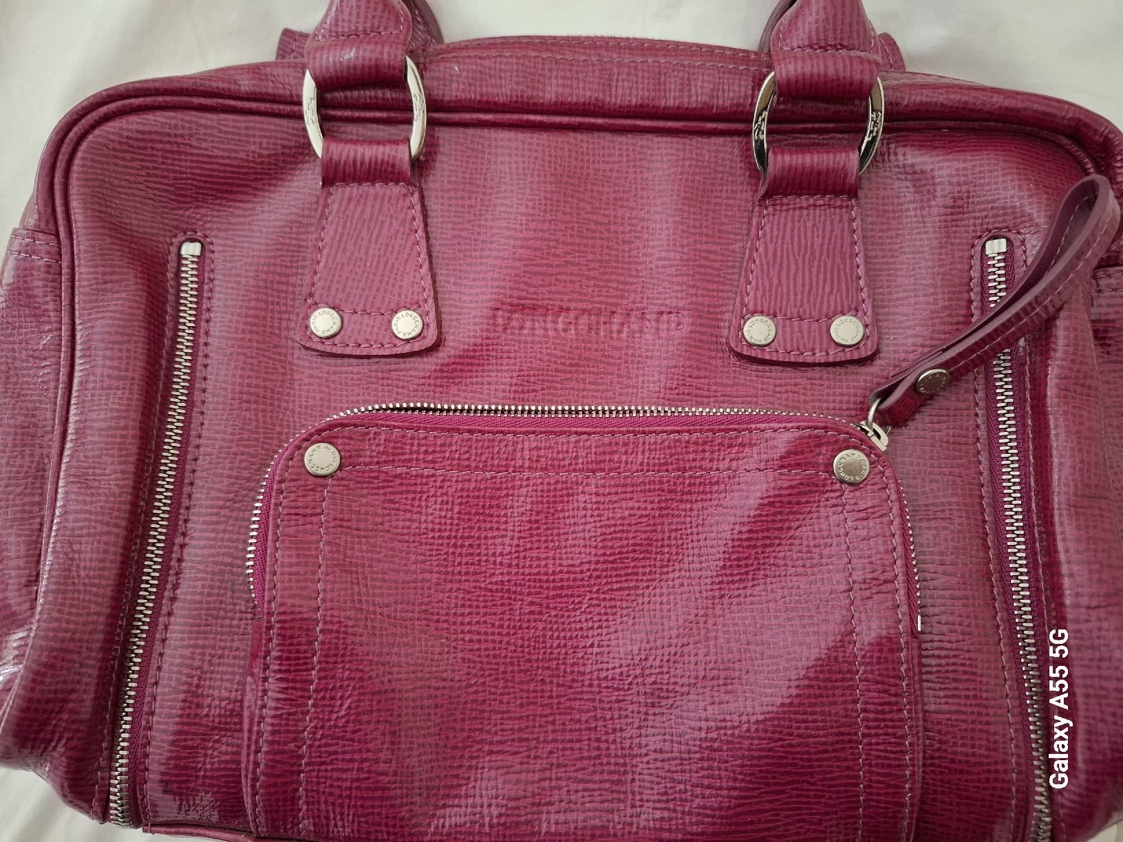 Longchamp Borse da donna: Sac à main Longchamp rose en cuir vernis – Usato da Payerne venduto da wardi11 1