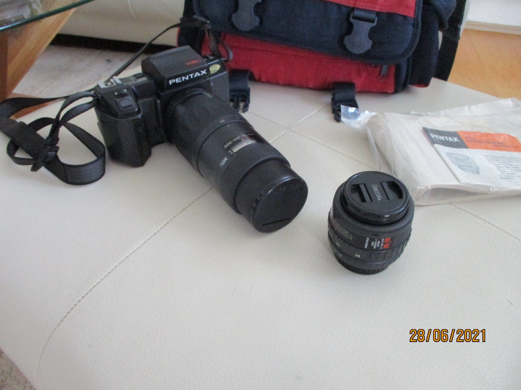 Pentax Fotocamera: Pentax SFxN Analog Kamera mit Zubehör – Usato da Liestal venduto da Disc-Point 5