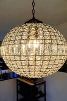 Lampadario sferico a sospensione in vetro e ottone