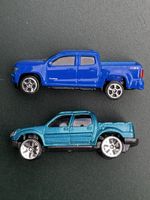 Zwei amerikanische Pickups, Chevrolet Colorado und Ford Trac