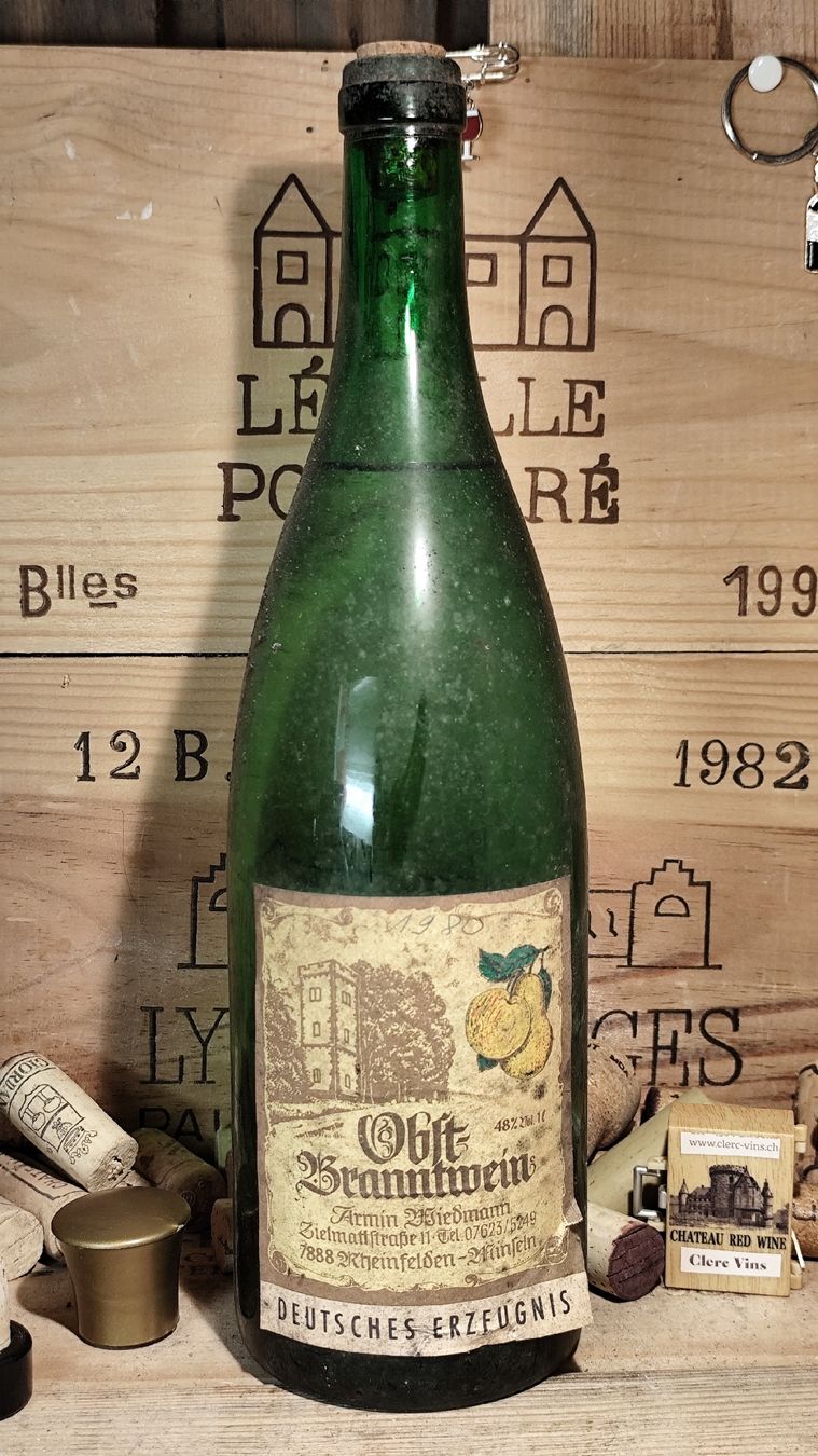Bevande alcoliche: Obst Branntwein 48vol. % A. Wiedmann – Nuovo e nell'imballaggio originale da Büsserach venduto da Vintage-vins 2