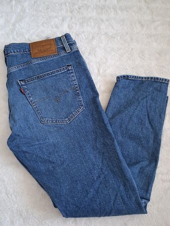 Levi's Premium en  bleu, coupe 512, taille W33 L30. femme