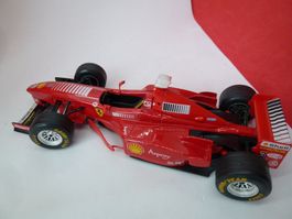 F1 Ferrari F300 - M.Schumacher No 3 - Bburago 1:24 -   %%%%