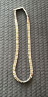 Elegantes Collier bicolor mit integrierten Heilmagneten