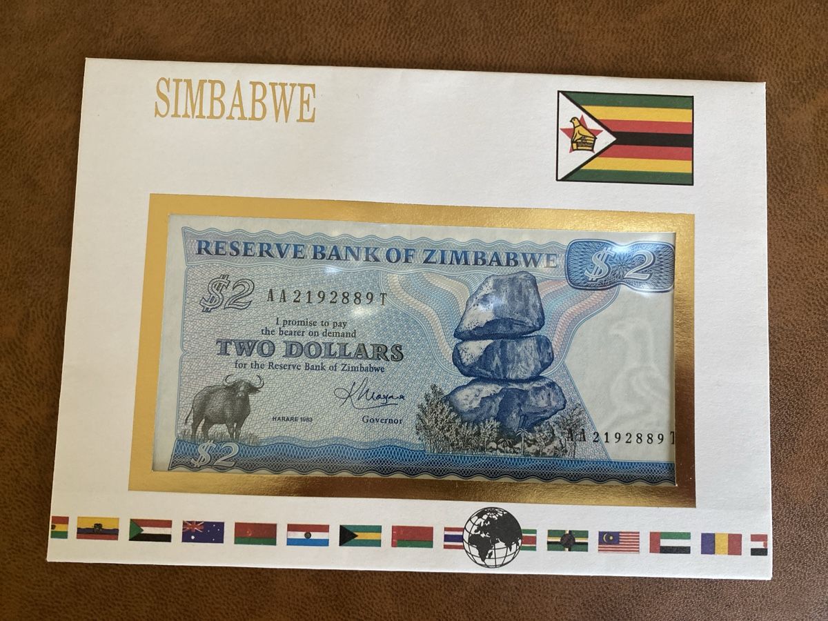 Billets de banque: Zimbabwe 2 Dollar Notenbrief – Neuf avec emballage d'origine à Thörishaus par luc_nsv9