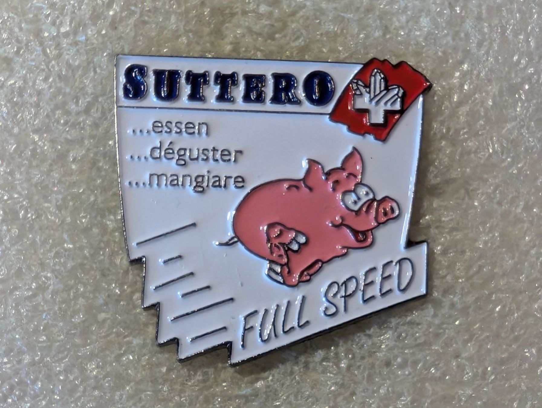 Placchette & Badge: Ansteckpin 182: Suttero – Usato da Oppligen venduto da Pin-Fall-Shop