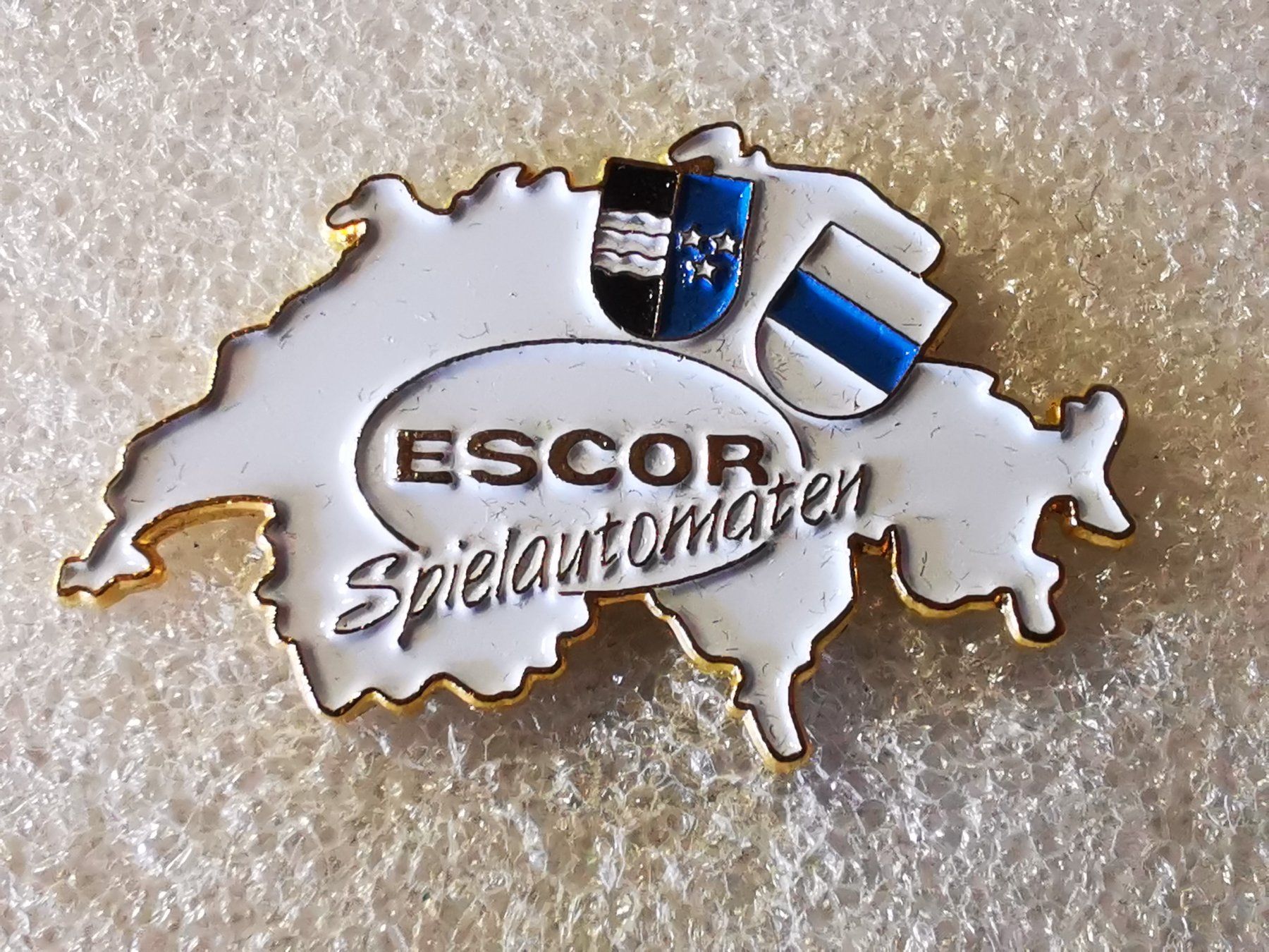 Placchette & Badge: Ansteckpin 148: Escor – Usato da Oppligen venduto da Pin-Fall-Shop