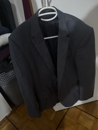 Veste de costard grise. 