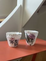 Zwei Porzellan Windlichter - florales Dekor