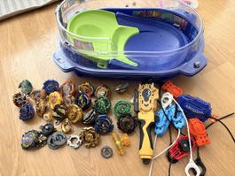 Beyblades lot with stadium and launchers, used