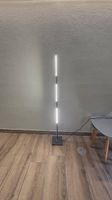 Lampadaire LeuchtenDirekt d'angle 