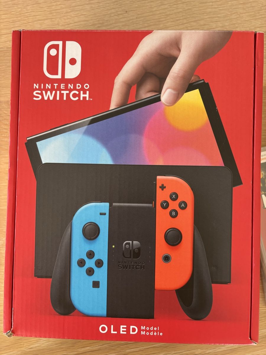 Nintendo Console: Nintendo Switch OLED Rot/Blau NEU & versiegelt + OVP + Games – Nuovo e nell'imballaggio originale da Wangen ZH venduto da cri_rnp9 1