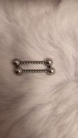 Silberne Piercings