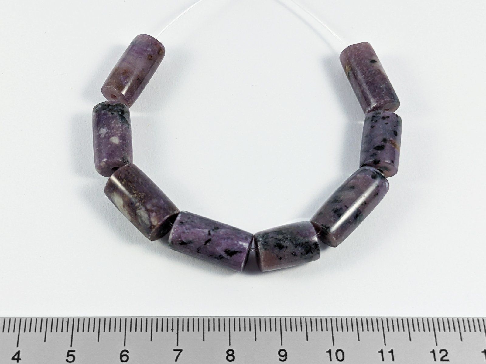 Minerali & Pietre curative: Charoit Zylinder Perlen 12 bis 18mm, 8Stk. – Nuovo e nell'imballaggio originale da Meilen venduto da GypsyCat