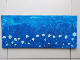 "edelweiss in front of Swiss mountains"