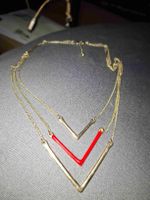 Collier multi-rangs doré avec motifs