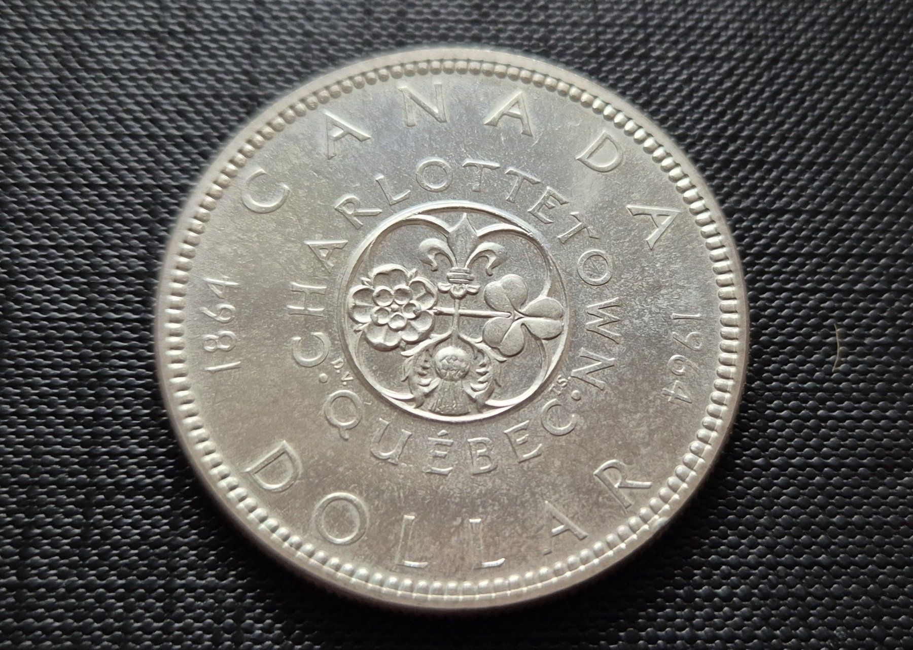 Tutti le monete: 1$ CANADA 1964 Quebec / Charlottetown – Usato da Zürich venduto da brinkosos 1