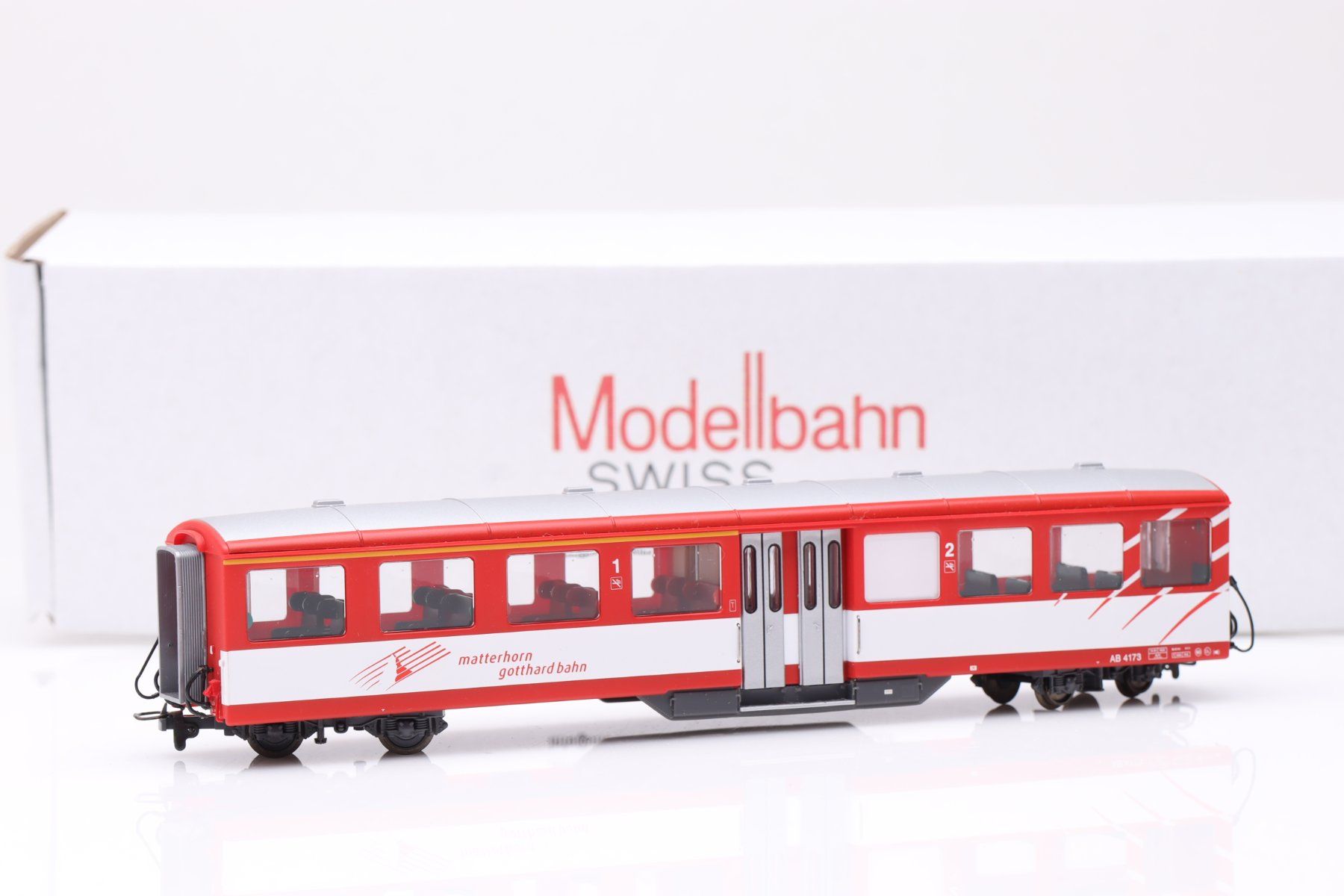 Bemo Modellini di ferrovie: Bemo MGB AB 4173 Mitteleinstiegwagen DC, H0m – Usato da Ried (Muotathal) venduto da Modellbahn.swiss