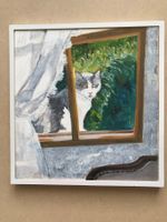 Katze hinter dem Fenster