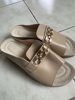 Chic beige slip-on sandals with gold chain detail, size 38
