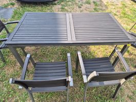 Gartentisch mit Stühlen dunkelgrau Metall Kunststoff