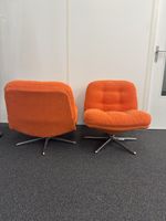 2 Orange Swivel Chairs good condition