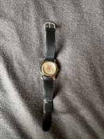 Uhr mit 1franken mit Jahrgang 1958