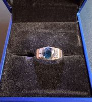 750- er Gold Damenring mit blauem Stein und Diamanten