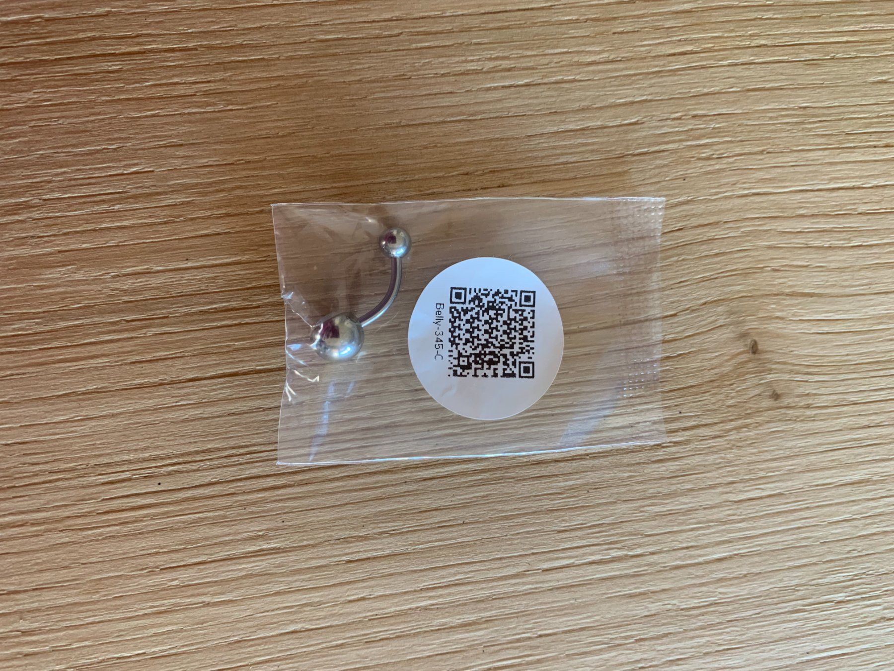 Piercingschmuck: Piercing Bauchnabelring mit Opalit in Lünettenfassung – Neu und originalverpackt aus Sissach von SwissCyclist 1