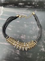 New necklace with stones made of steel & leather