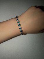 Swarovski Armband mit grünen Steinen, Top!