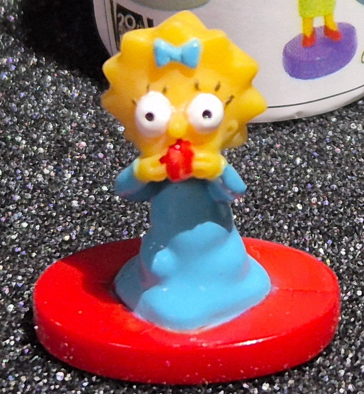 Statuette: Ü-Ei Figur Simpsons Maggie mit Schnuller – Nuovo (secondo la descrizione) da Burgdorf venduto da MIDICLORIAN