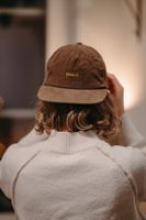 Cord Cap braun mit Stickerei “real”, verstellbar