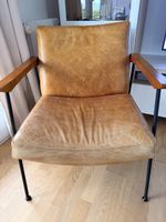 Fauteuil en cuir marron vintage pieds métal noir
