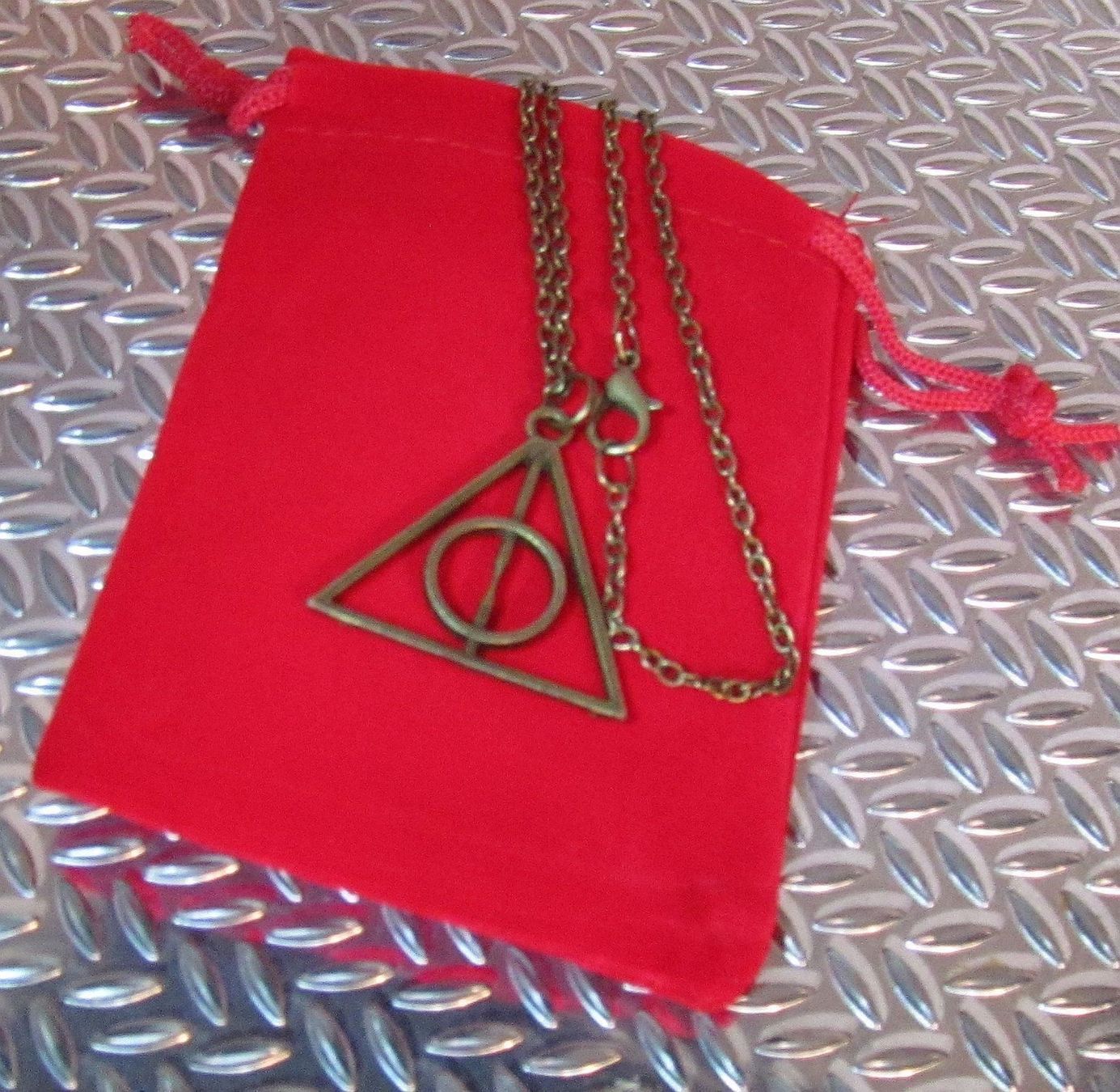 Catenine: Harry Potter Halskette Deathly Hallows Bronze – Nuovo e nell'imballaggio originale da St. Margarethen TG venduto da ursk10 6