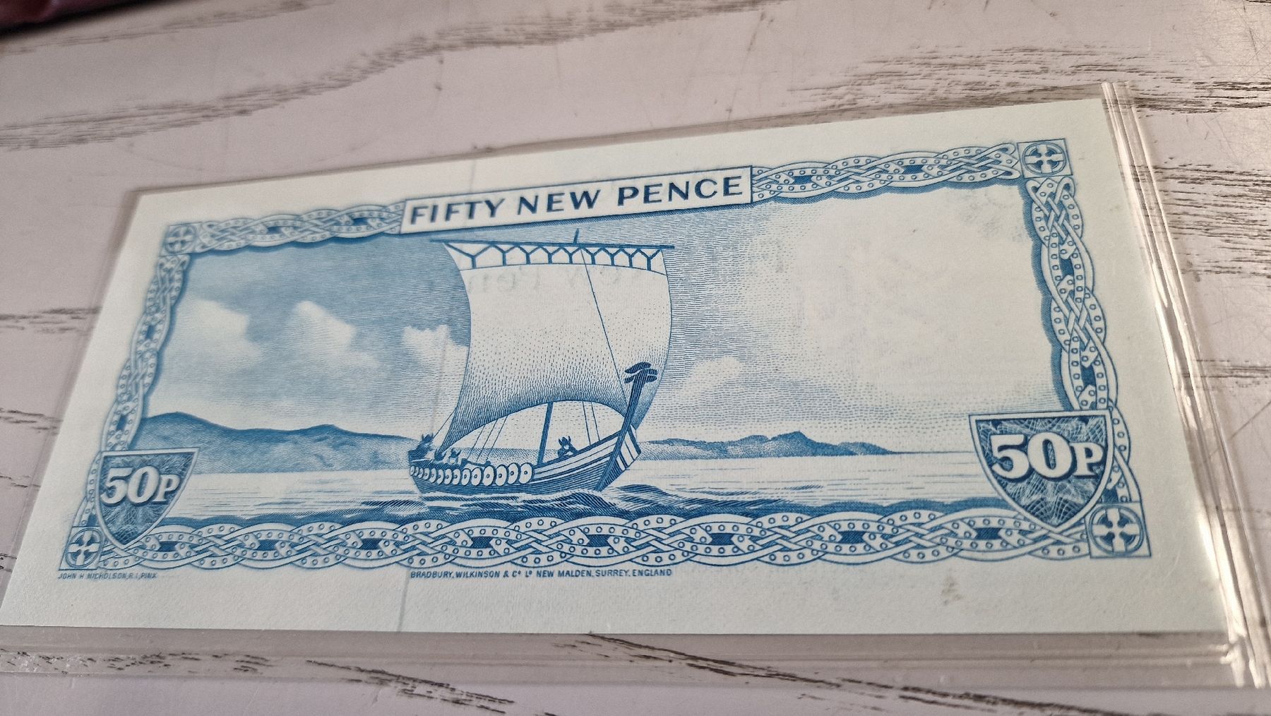 Banconote: Isle of Man 50p Banknote  – Nuovo e nell'imballaggio originale da Herisau venduto da Antiques.AR 1