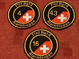3 Badge der Alarmtruppe