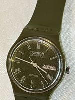 Montre Swatch Quartz verte cadran chiffres romains