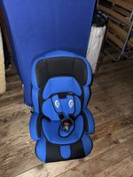 Blauer Kinderautositz, gut erhalten!