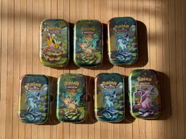 Pokémon Prismatic Evolutions mini Tins (7x) sealed (EN)