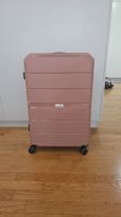 Valigia rigida rosa cipria, perfetta per le vacanze!