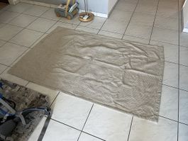 Tapis fin blanc crème et noir 