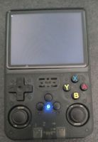 Console de jeux rétro portable R36S  neuve! Avec Pokémon