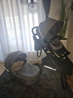 Kinderwagen Stokke mit Babywanne und Tasche