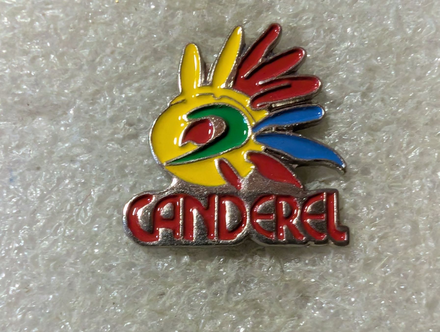 Placchette & Badge: Ansteckpin 126: Canderel – Usato da Oppligen venduto da Pin-Fall-Shop