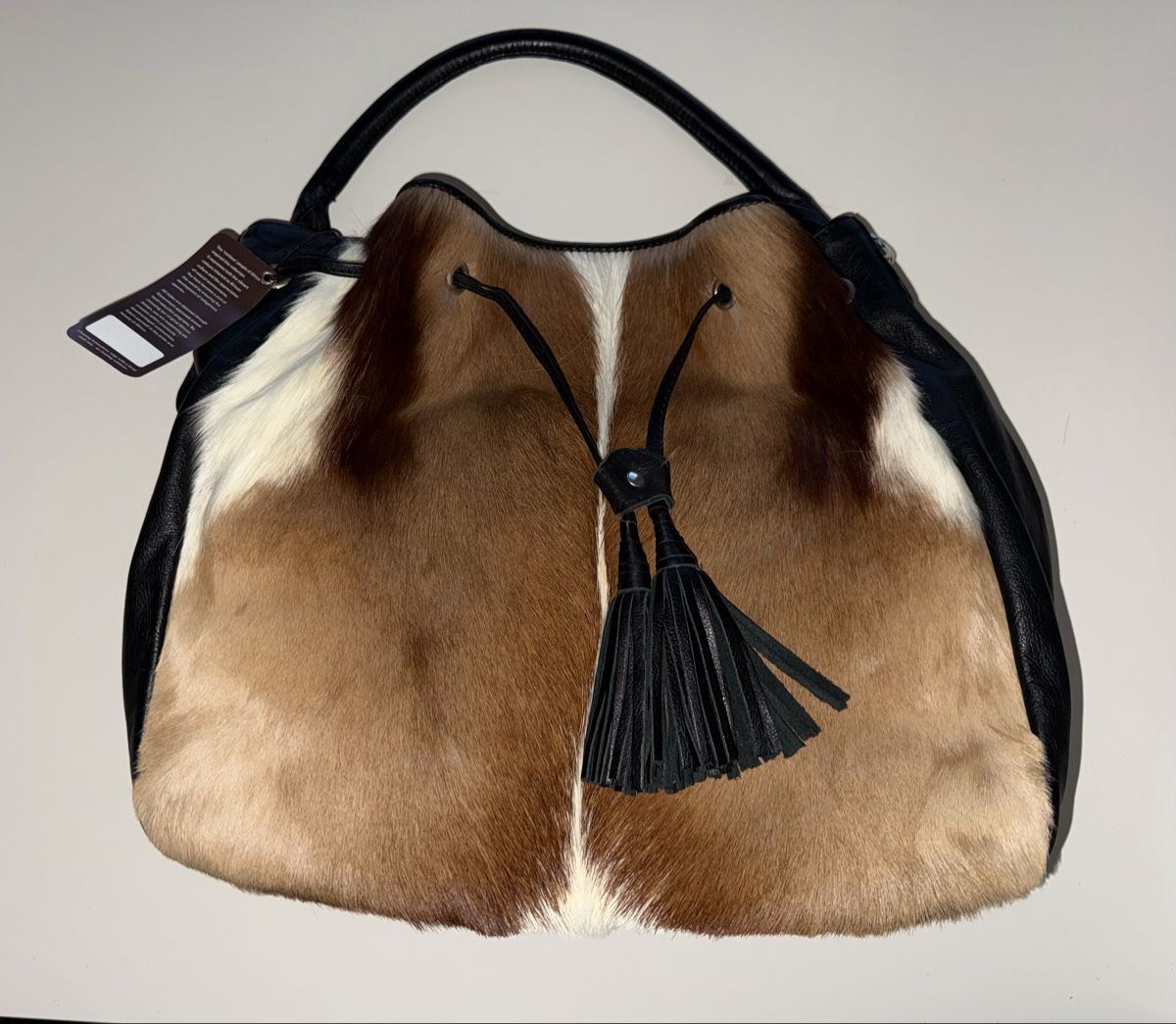 Borse: Ledertasche mit Fell – Nuovo e nell'imballaggio originale da St. Gallen venduto da Hongkong77