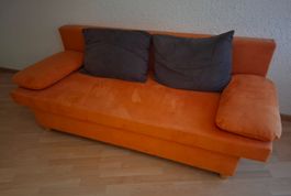 Bettsofa orange mit 4 Kissen