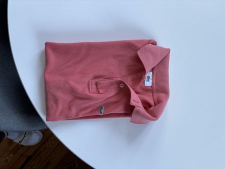 Polo Lacoste rose taille M état neuf